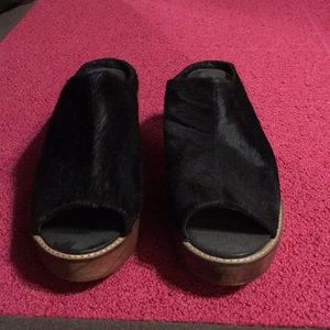 Open toe, clog style shoes